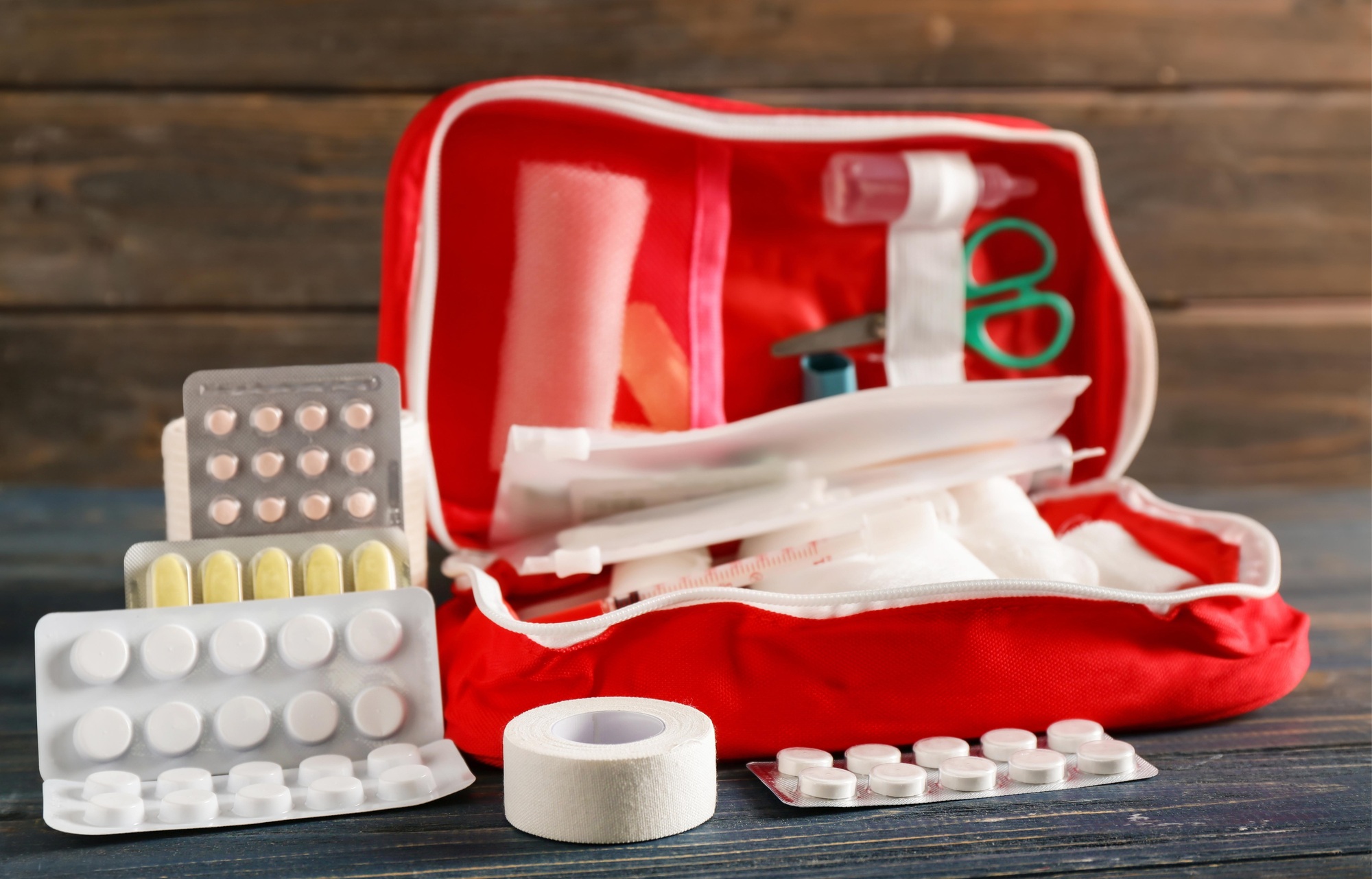 First aid kit concept, medicine equipment set in a suitcase box