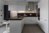 interior view of a modern kitchen with fresh fruit on the worktop near at sink
