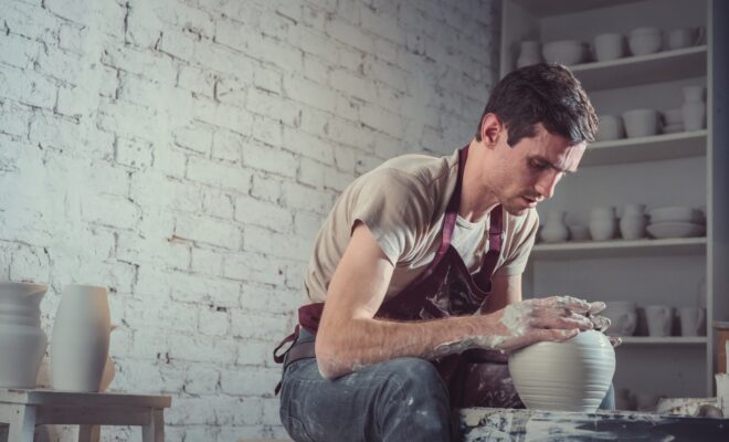 Worker making a ceramic vase